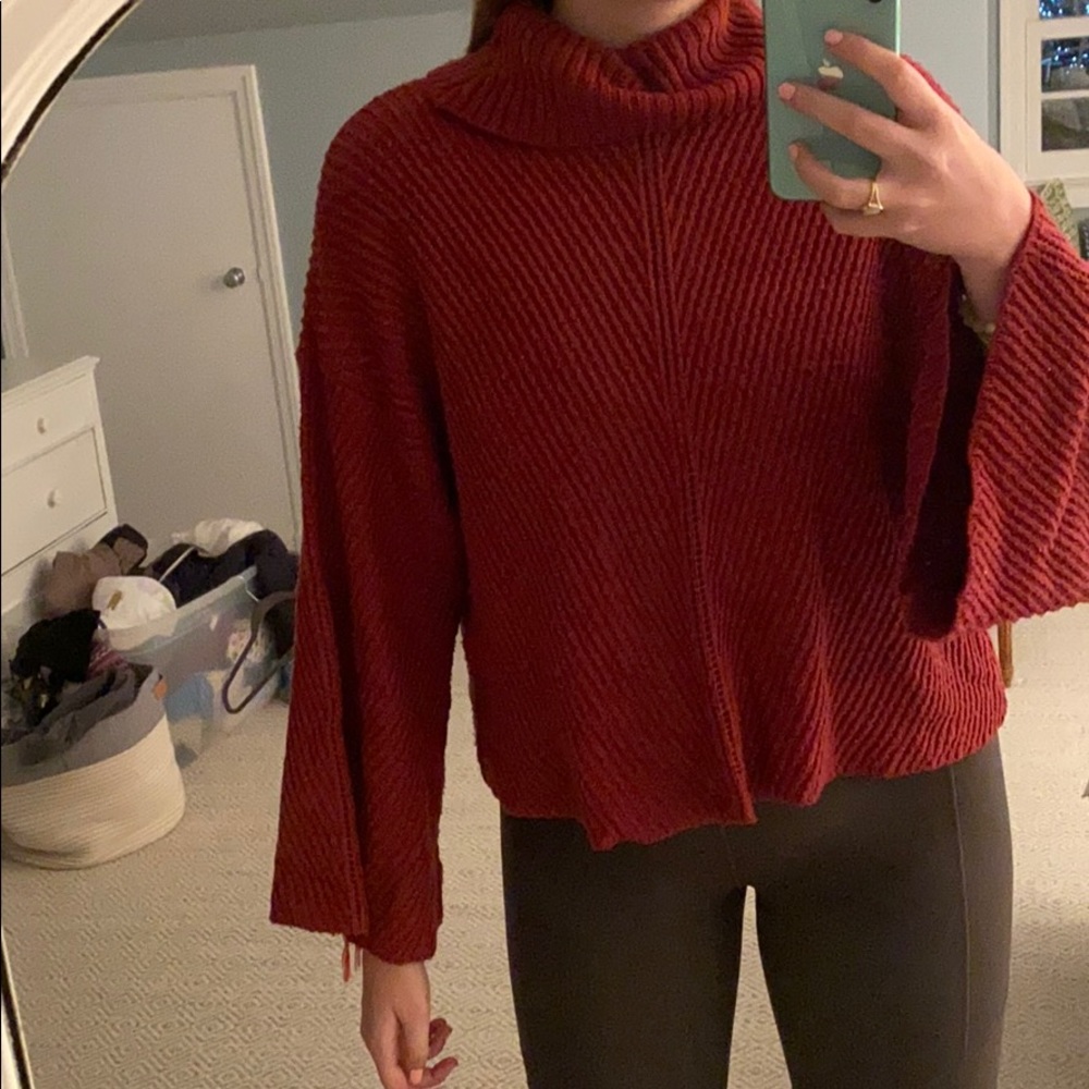 Burnt red knit turtleneck sweater